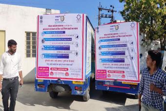 COVID-19 safety precaution banners on delivery vehicles